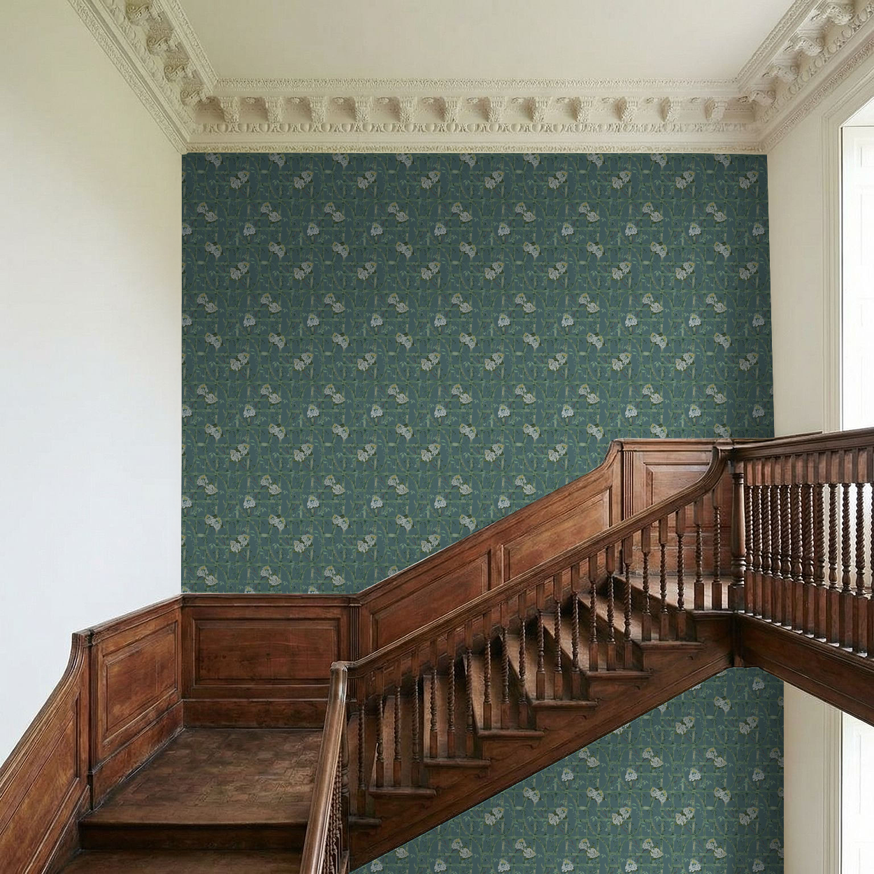 Green trellis wallpaper with hydrangeas in vintage stairwell setting.