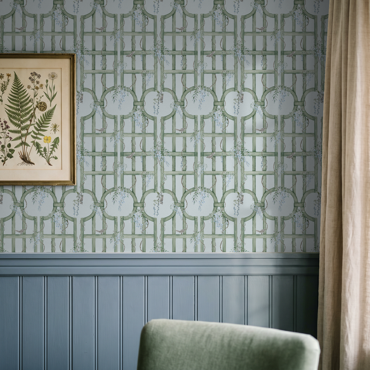 Green trellis wallpaper with blue accents in a cozy room setting