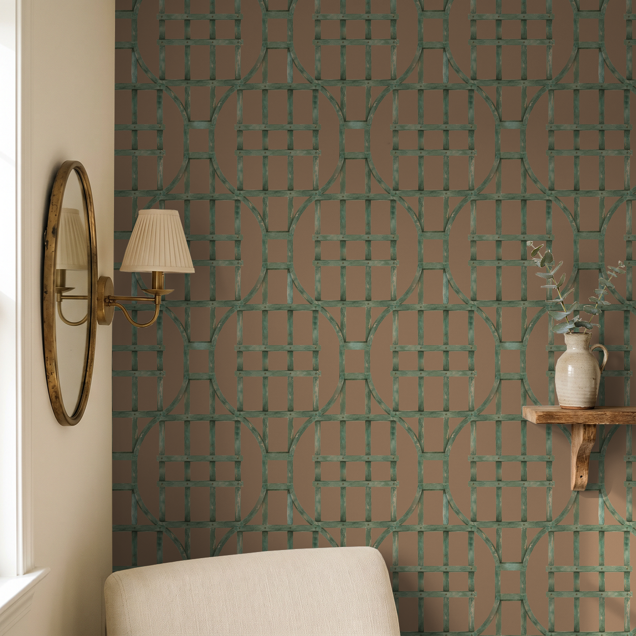 Green trellis pattern wallpaper in rustic room with mirror and shelf.