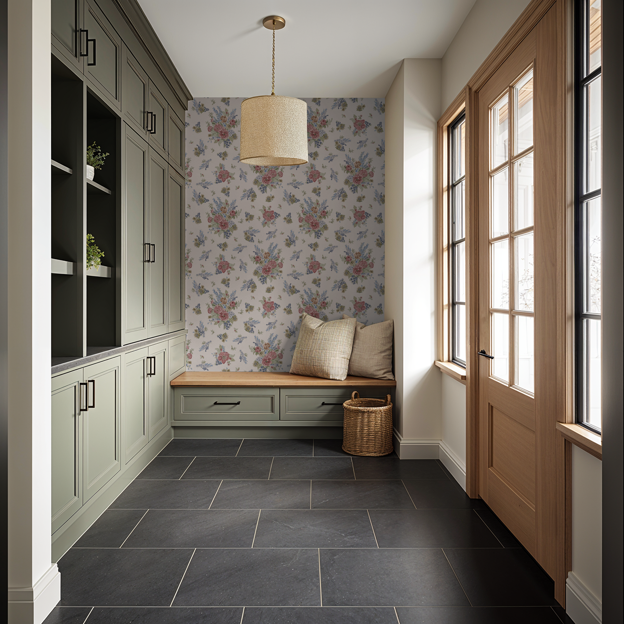 Mudroom with green cabinets, floral wallpaper, and a wooden bench.