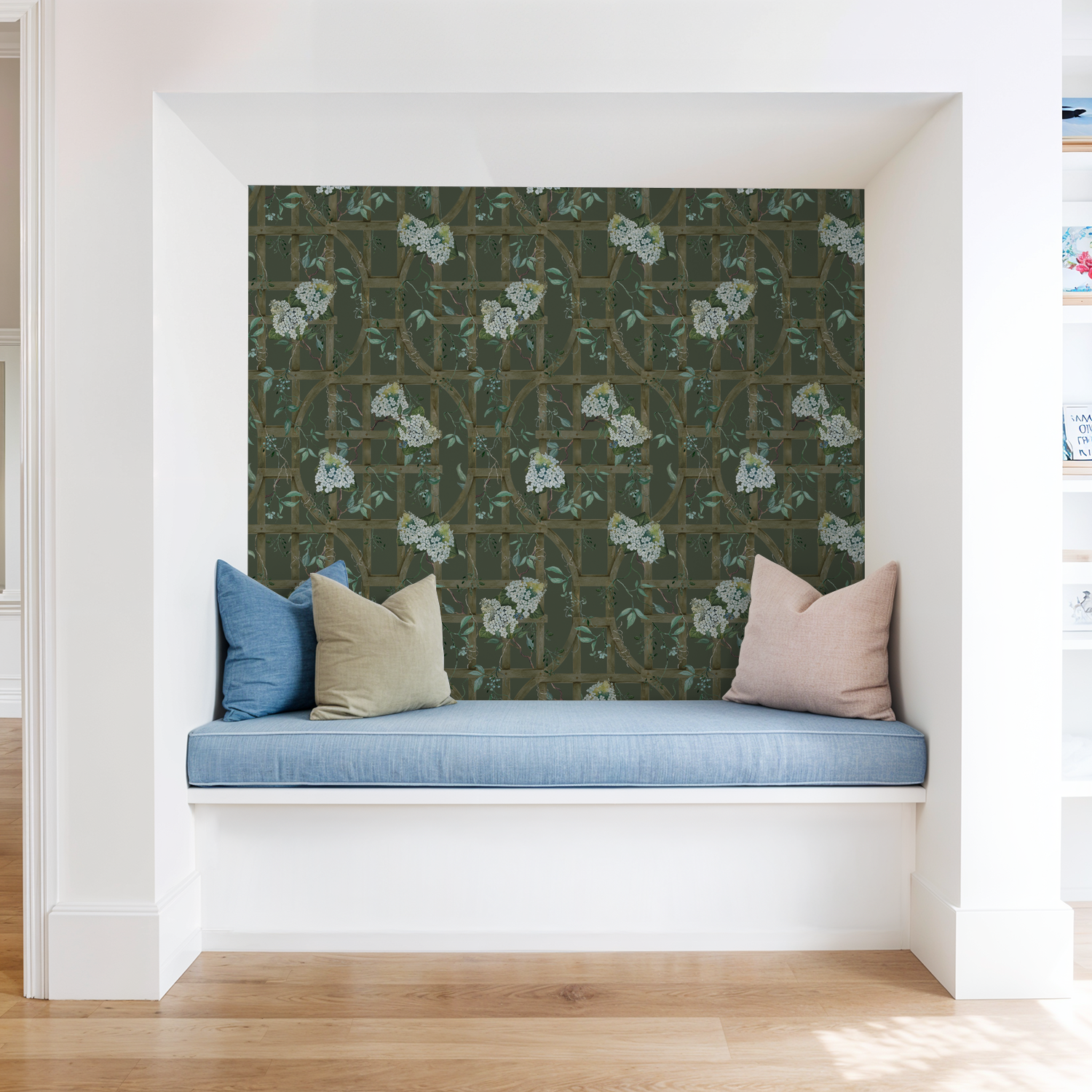 Hydrangea floral trellis wallpaper in cozy reading nook with cushions