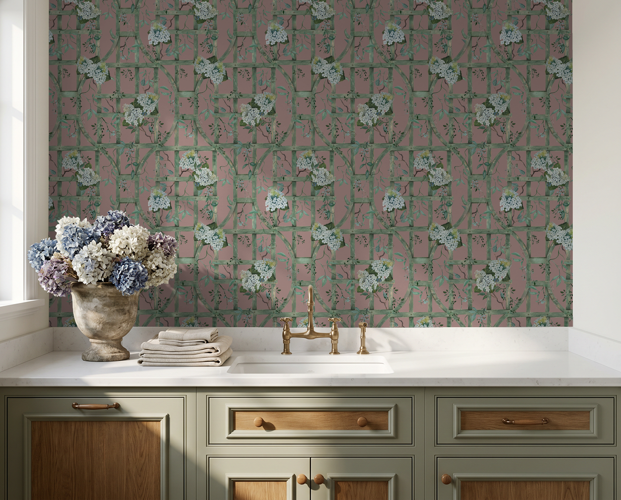 Hydrangea floral wallpaper with green trellis on deep rose in elegant kitchen setting.
