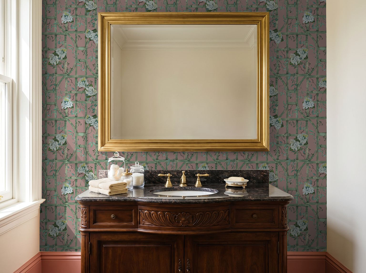Elegant bathroom with Hydrangea Row wallpaper in green trellis on deep rose.