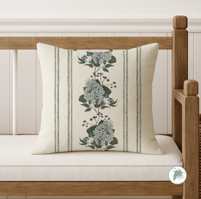 Decorative pillow with floral pattern on a wooden bench