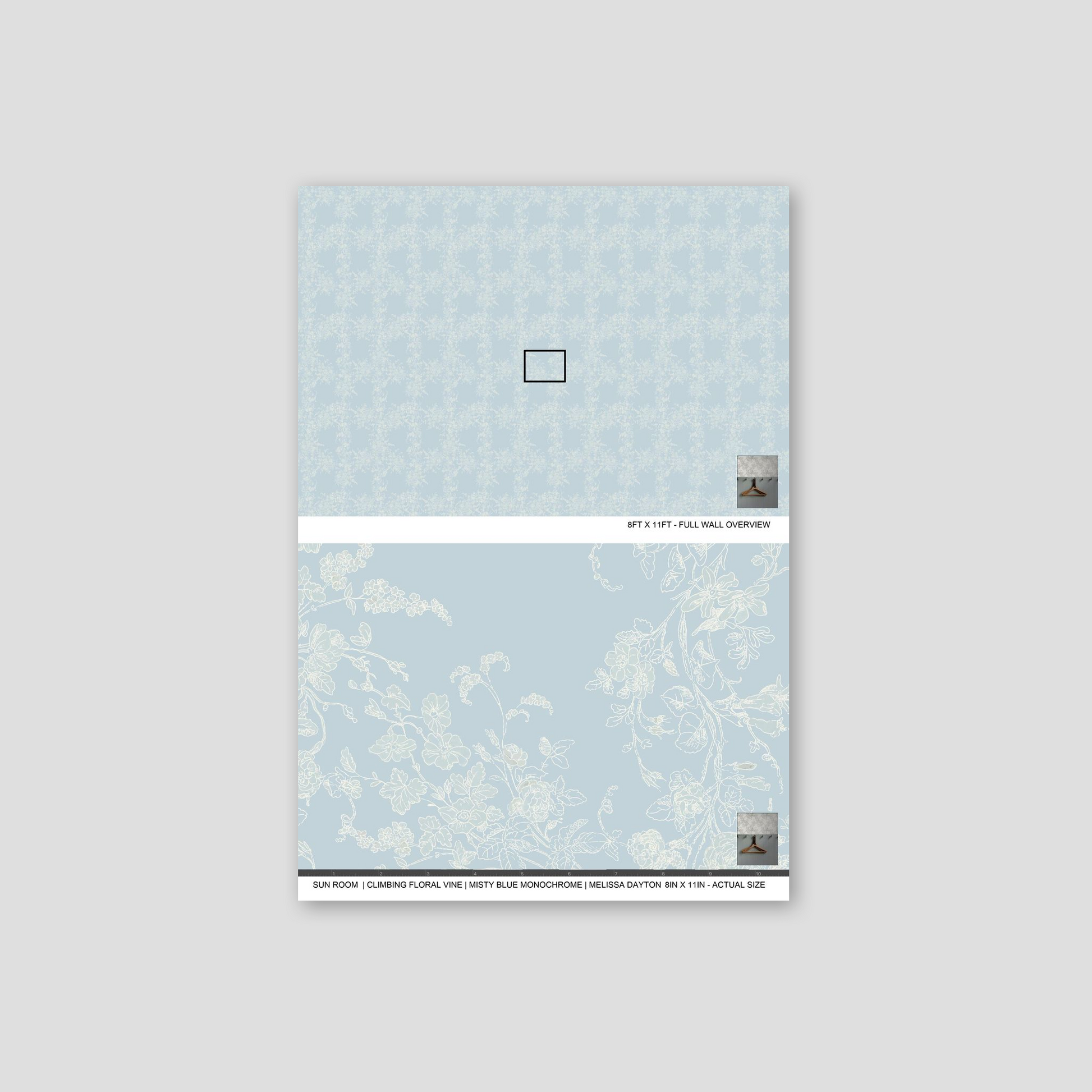 Misty blue floral vine wallpaper sample with intricate botanical patterns.
