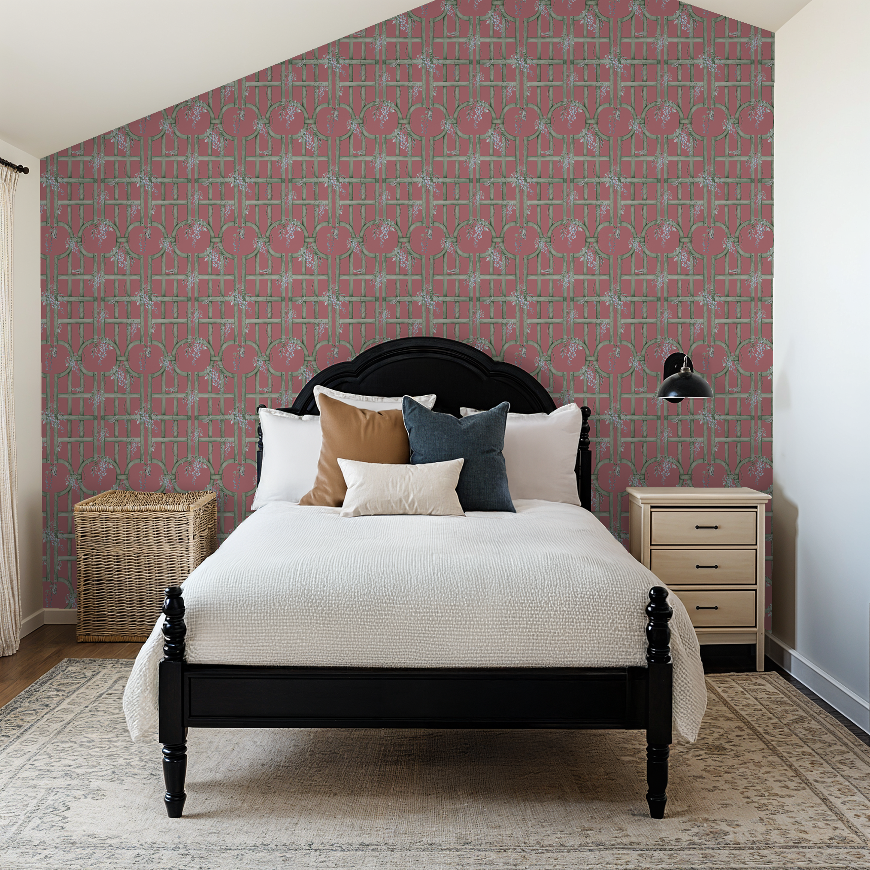 Bedroom with raspberry floral trellis wallpaper, black bed, and cozy decor.