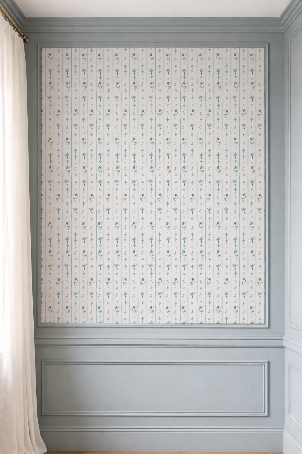 Decorative wall panel with a patterned design in a room with white curtains.