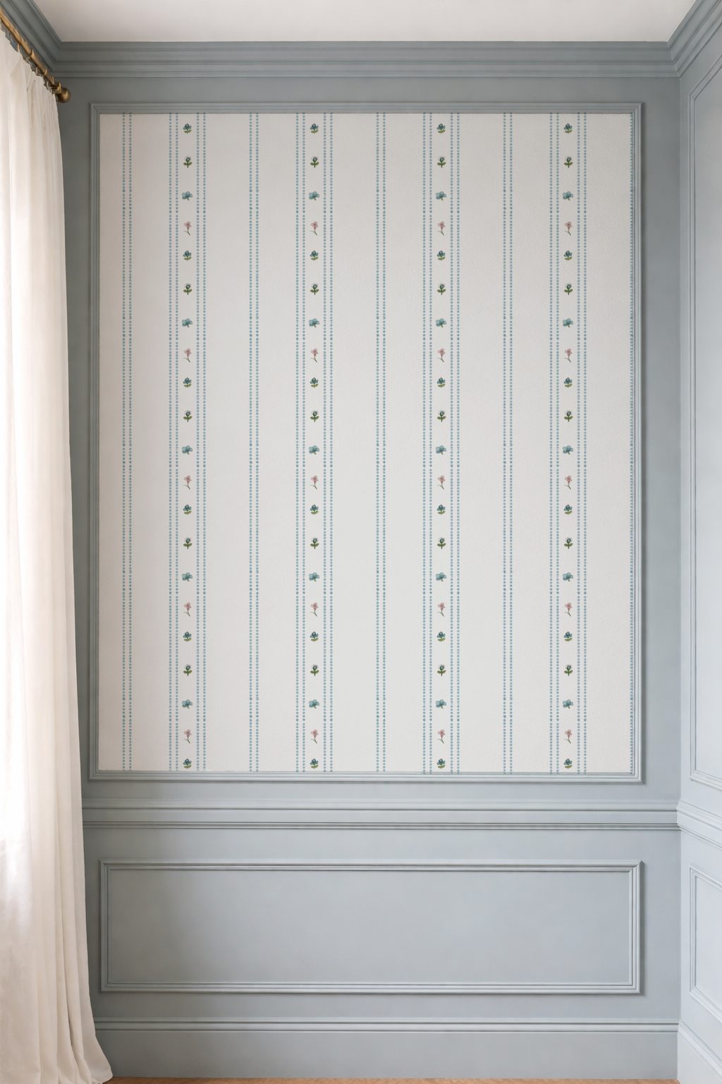 Decorative wall panel with a patterned design in a room with white curtains.