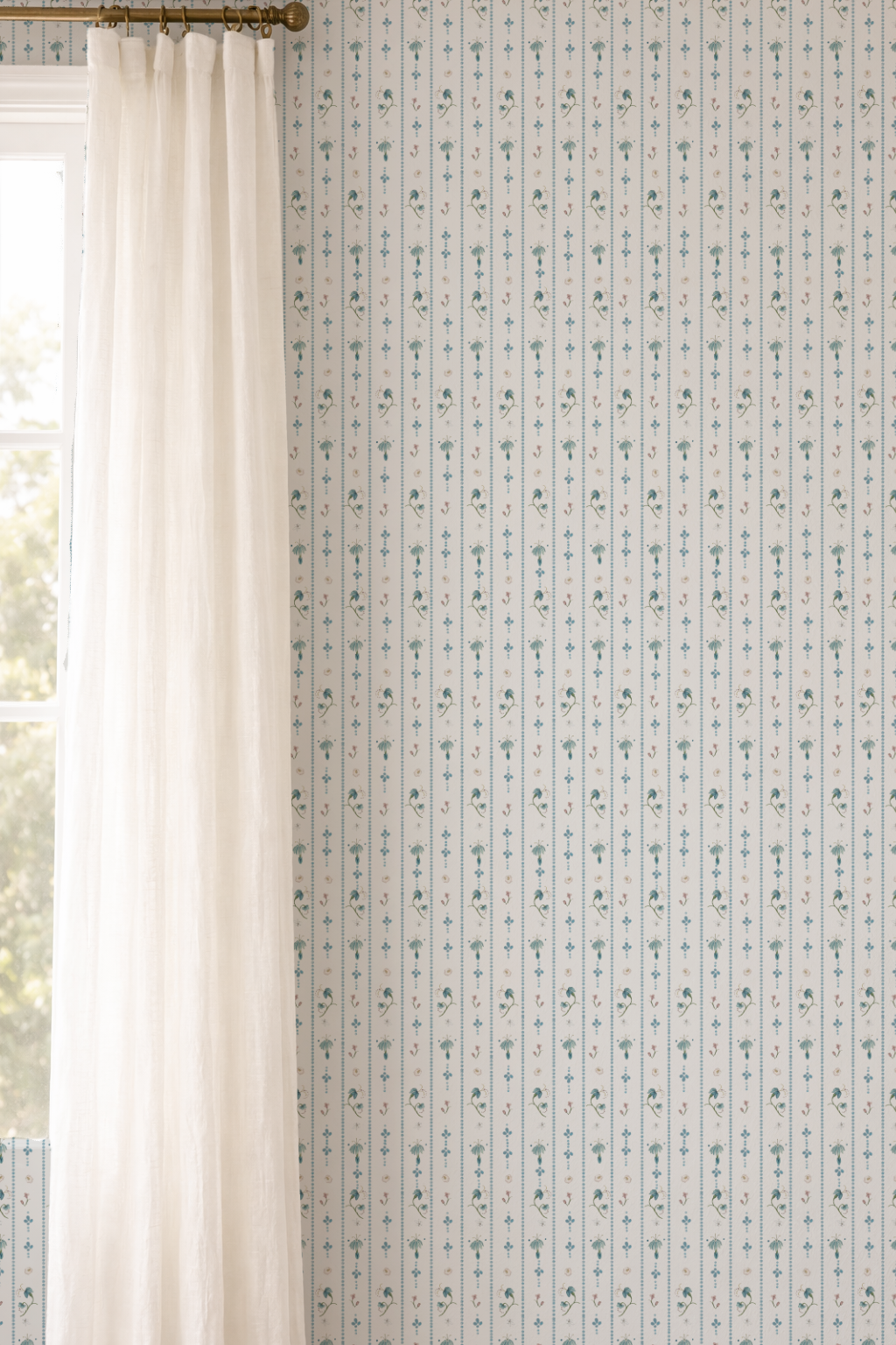 Window with white curtain and patterned wallpaper