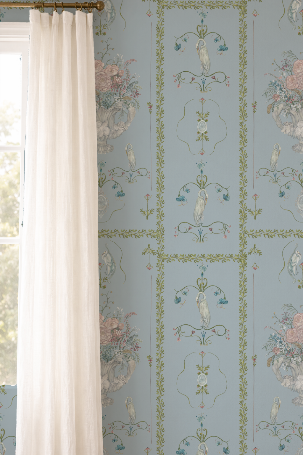 Decorative wallpaper with floral and bird patterns on a light blue background, paired with white curtains.