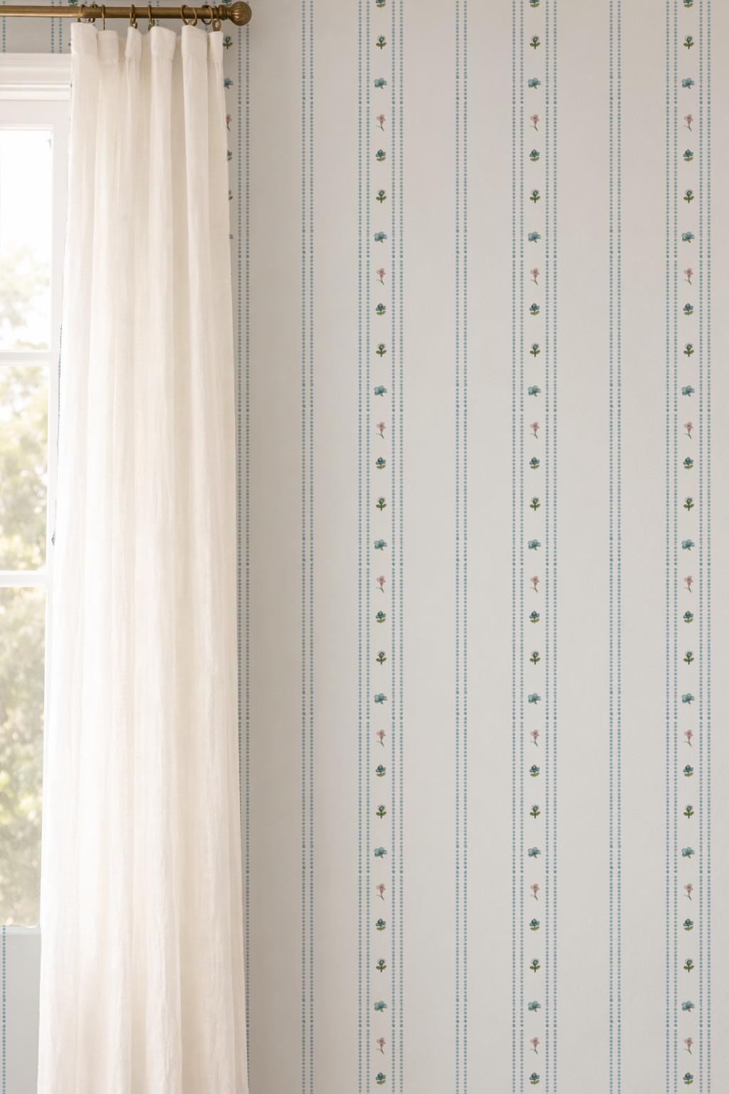 White curtain with vertical striped pattern in a room with natural light